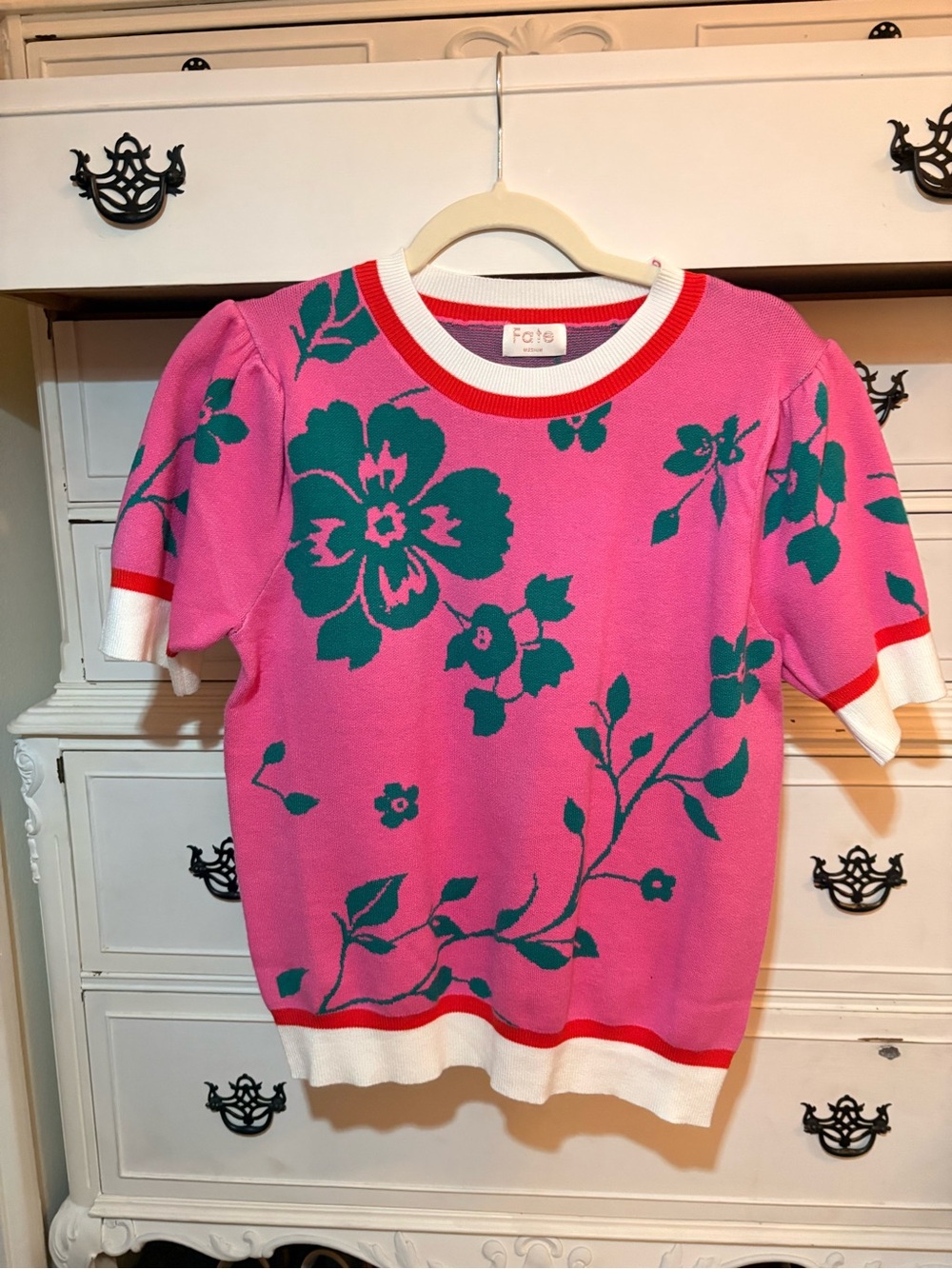 Fate Pink Sweater Tee with Teal Floral Motif and Red Trim